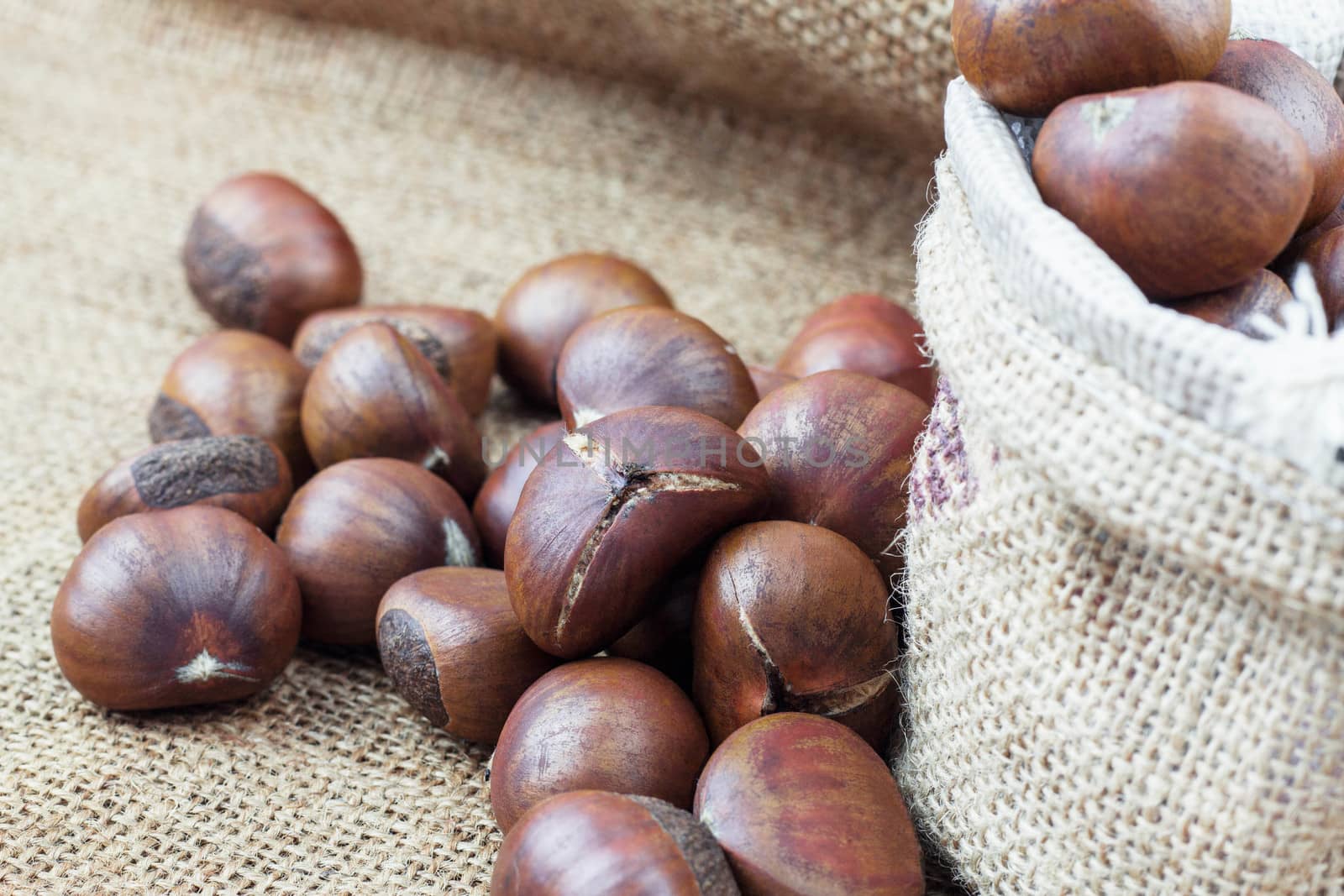 Chestnuts roasted on a sack.