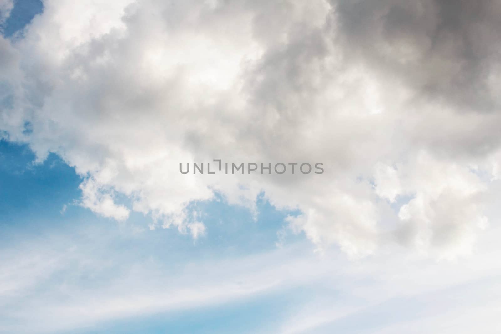 White clouds on the sky at daylight.