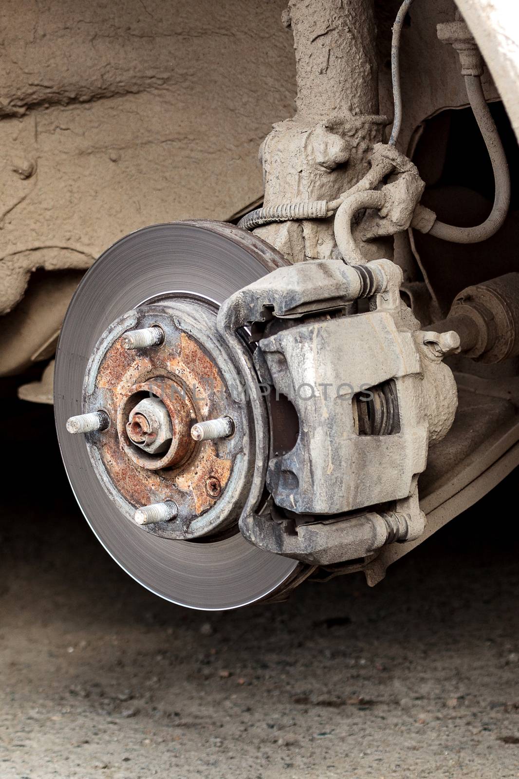 Closeup shot of car's disc brake without wheel on it