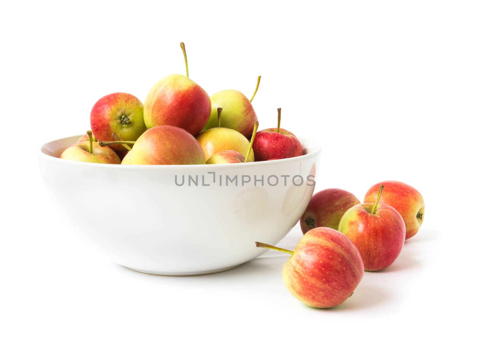 Closeup red apple on white bowl with white background, fruit healthy concept
