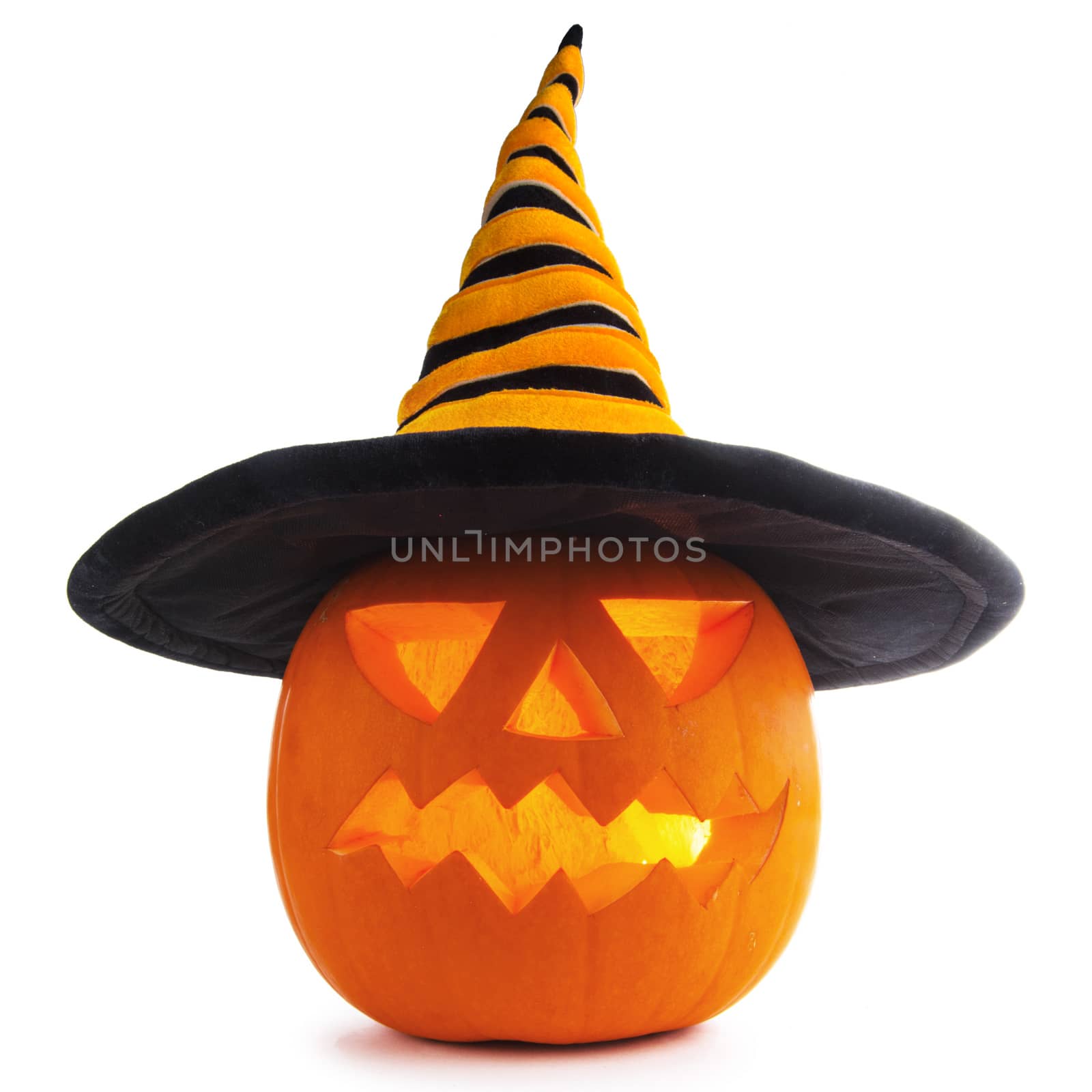 Jack O Lantern Halloween pumpkin with witches hat isolated on white background