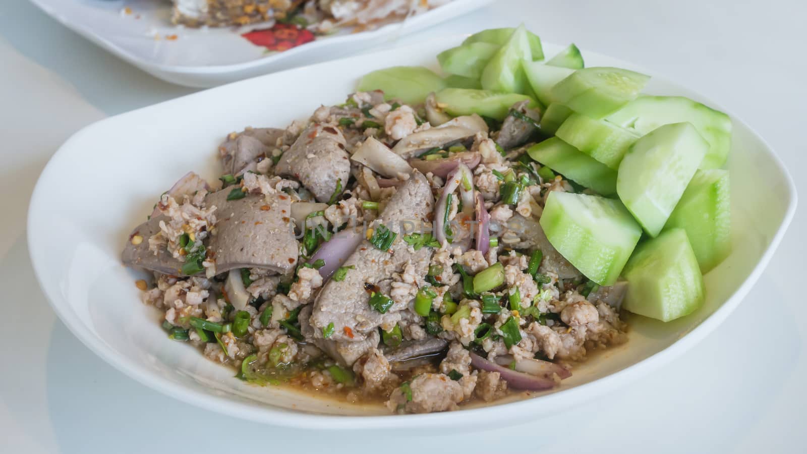 mixed fresh vegetable , minced pork and steamed liver , Thai spicy salad
