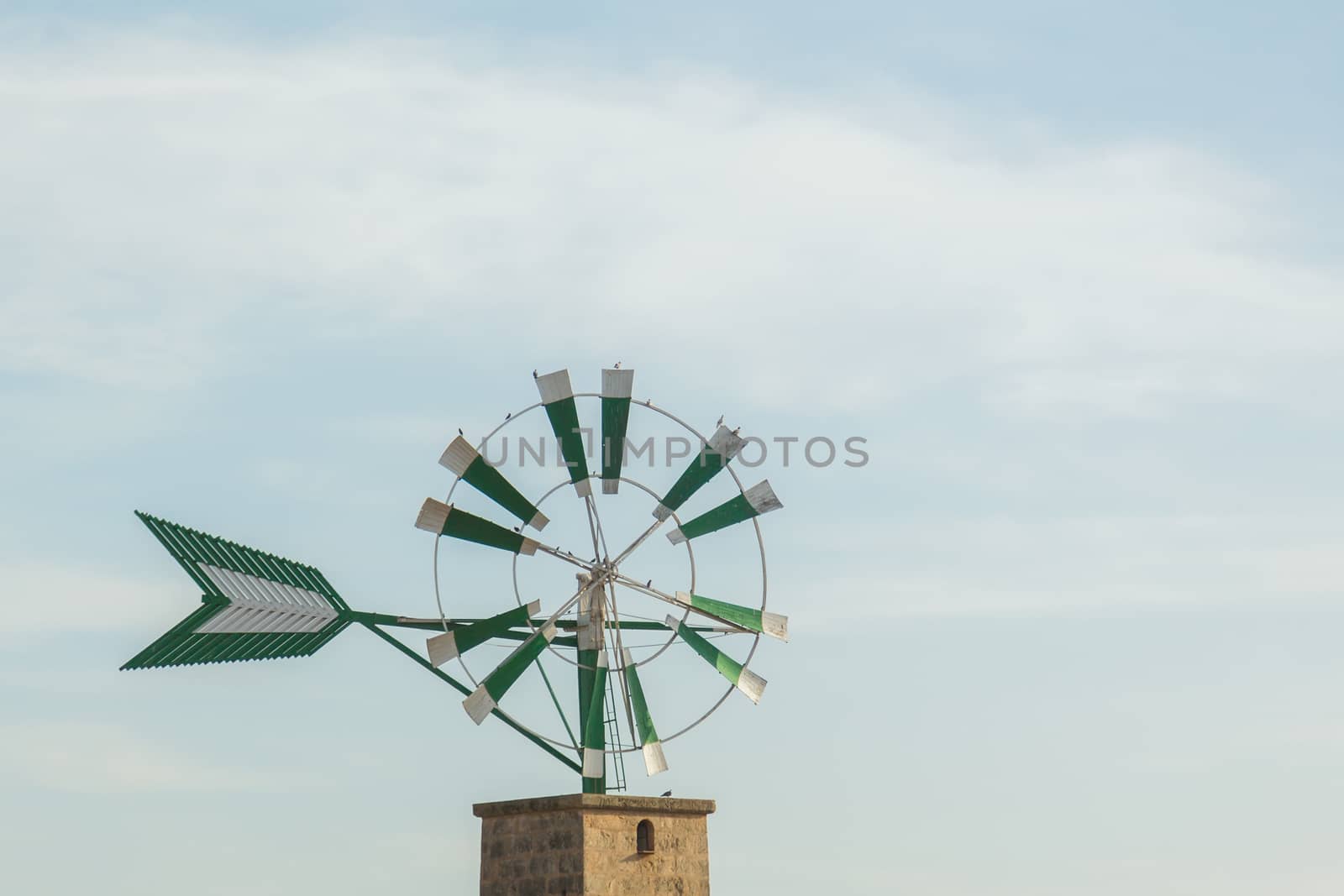 Old windmill against blue sky by sandra_fotodesign