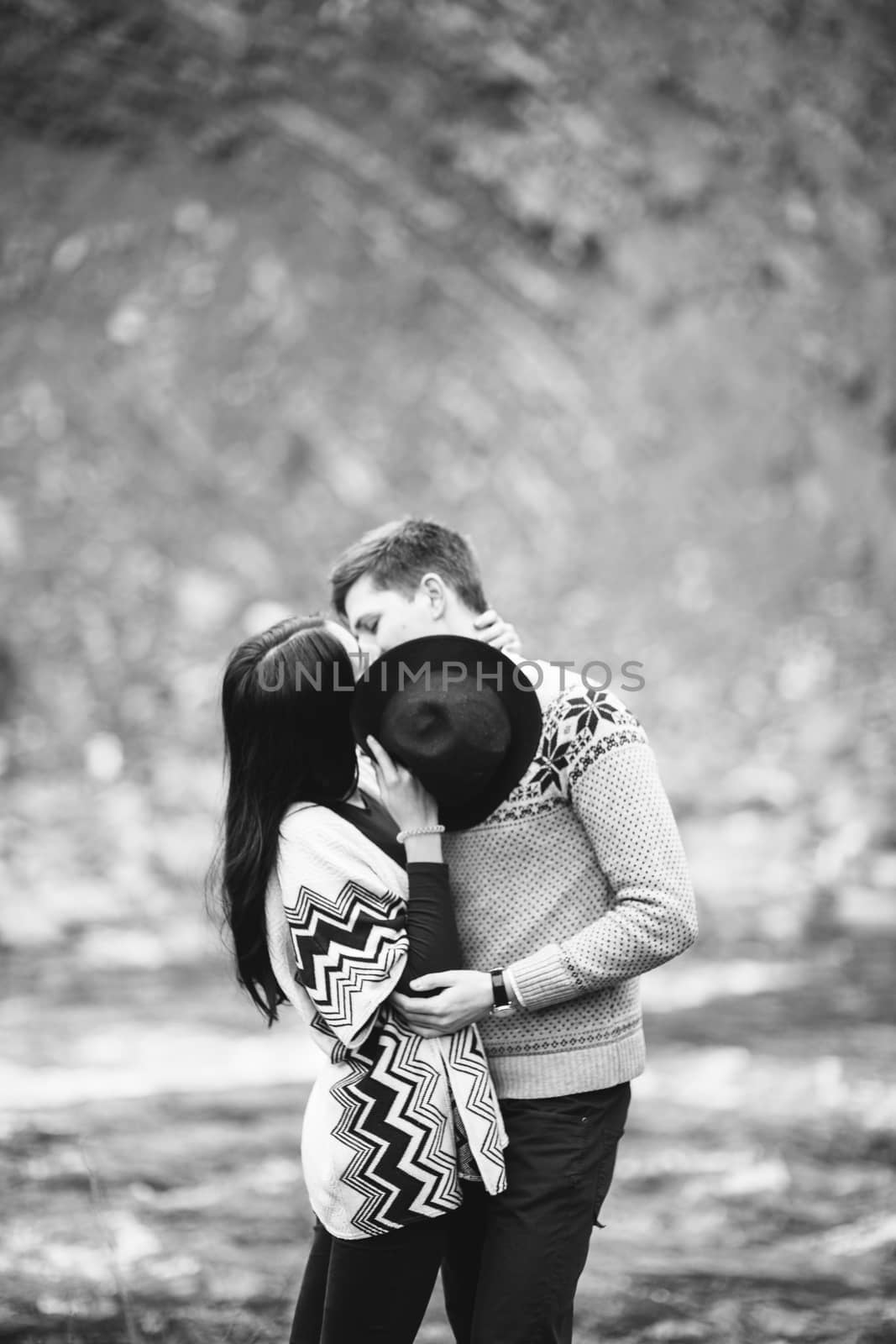 guy and girl along a mountain river by Andreua