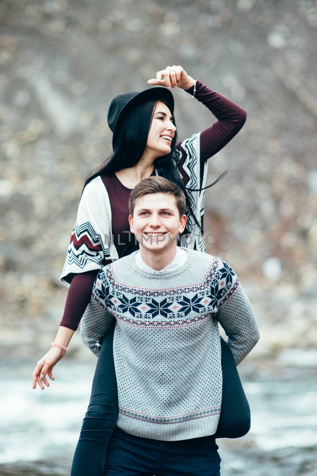 guy and girl along a mountain river by Andreua