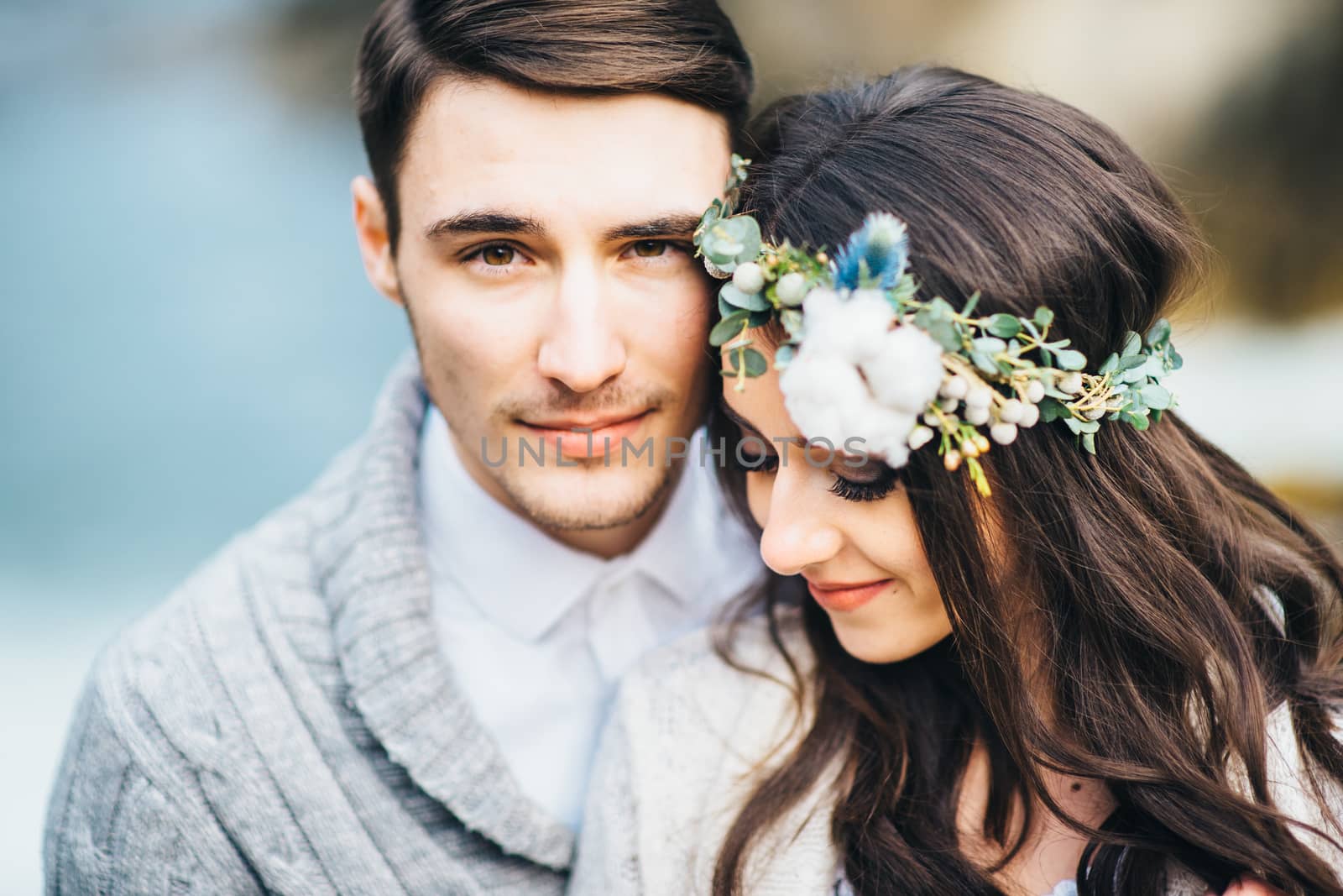 Сouple of newlyweds in the Carpathian waterfall, a wedding walk by Andreua