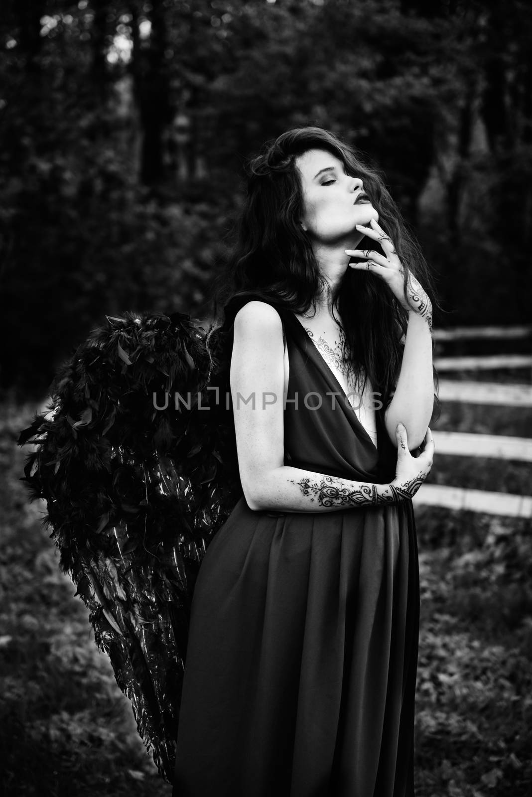 Fallen angel with black wings by Andreua