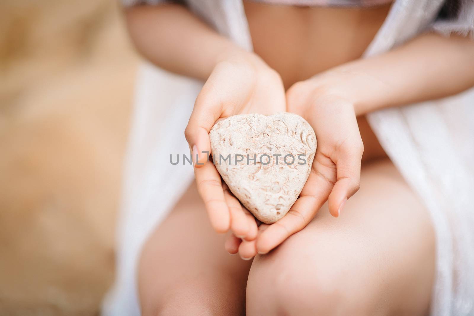 young girl bride in her underwear on the shore of the sea dreams of the future