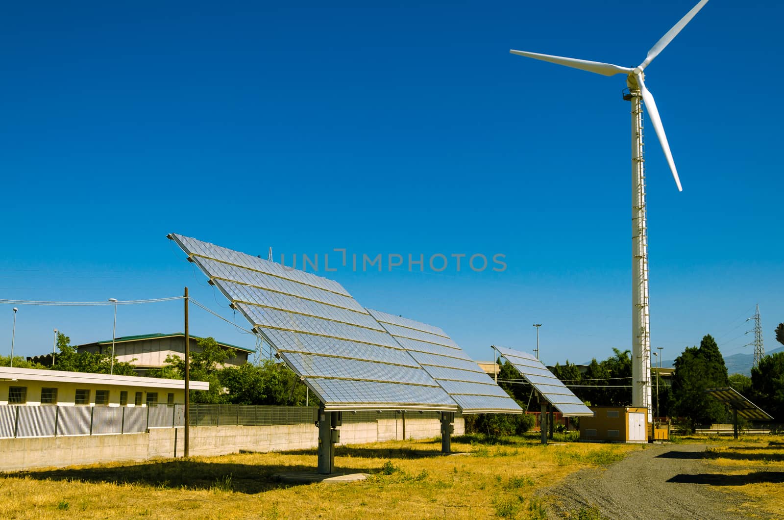 Solar panel and Wind turbine produces green, enviromentaly friendly energy from the sun.