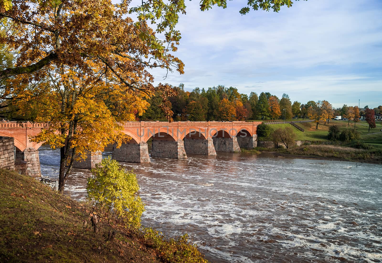 Brick bridge on the background of the autumn landscape,Reldiga,Latvia