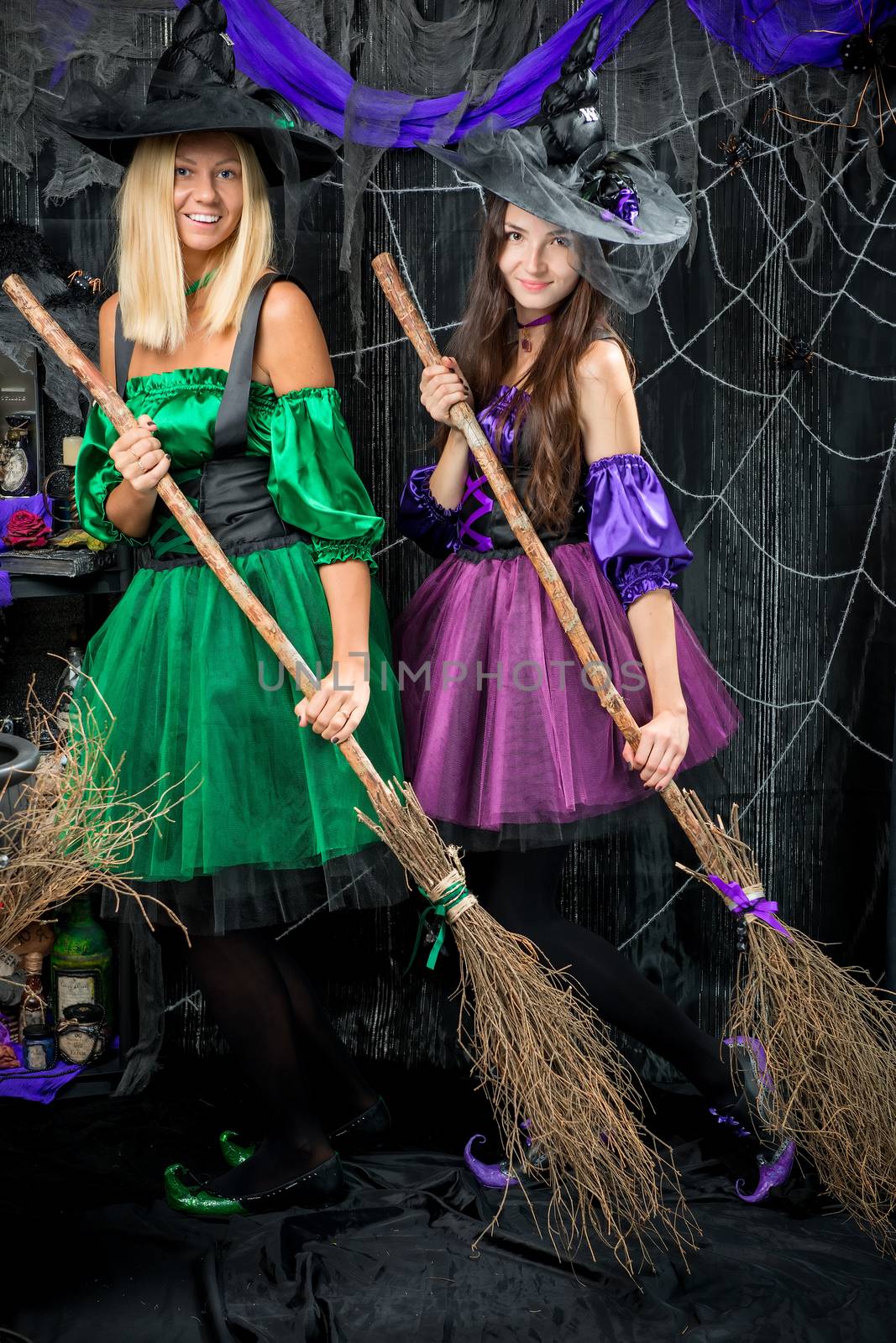 two adorable sorceresses with brooms to halloween by kosmsos111