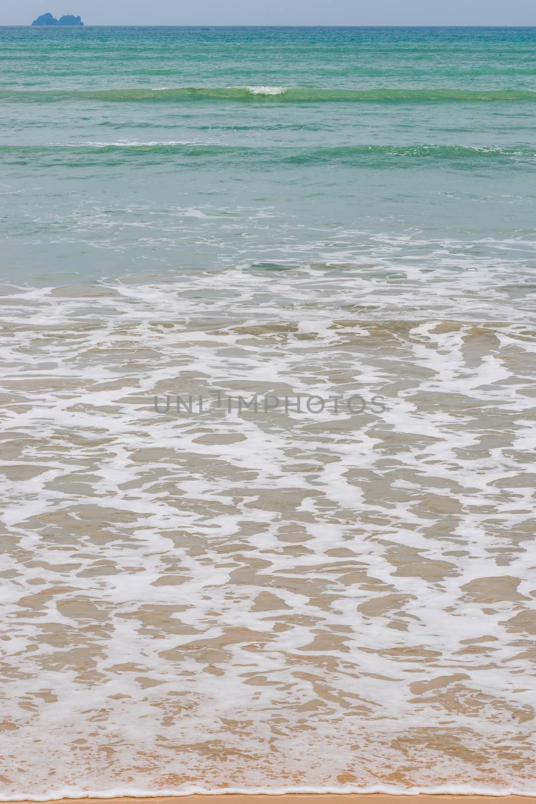 vertical landscape picture, sea water and horizon at the top