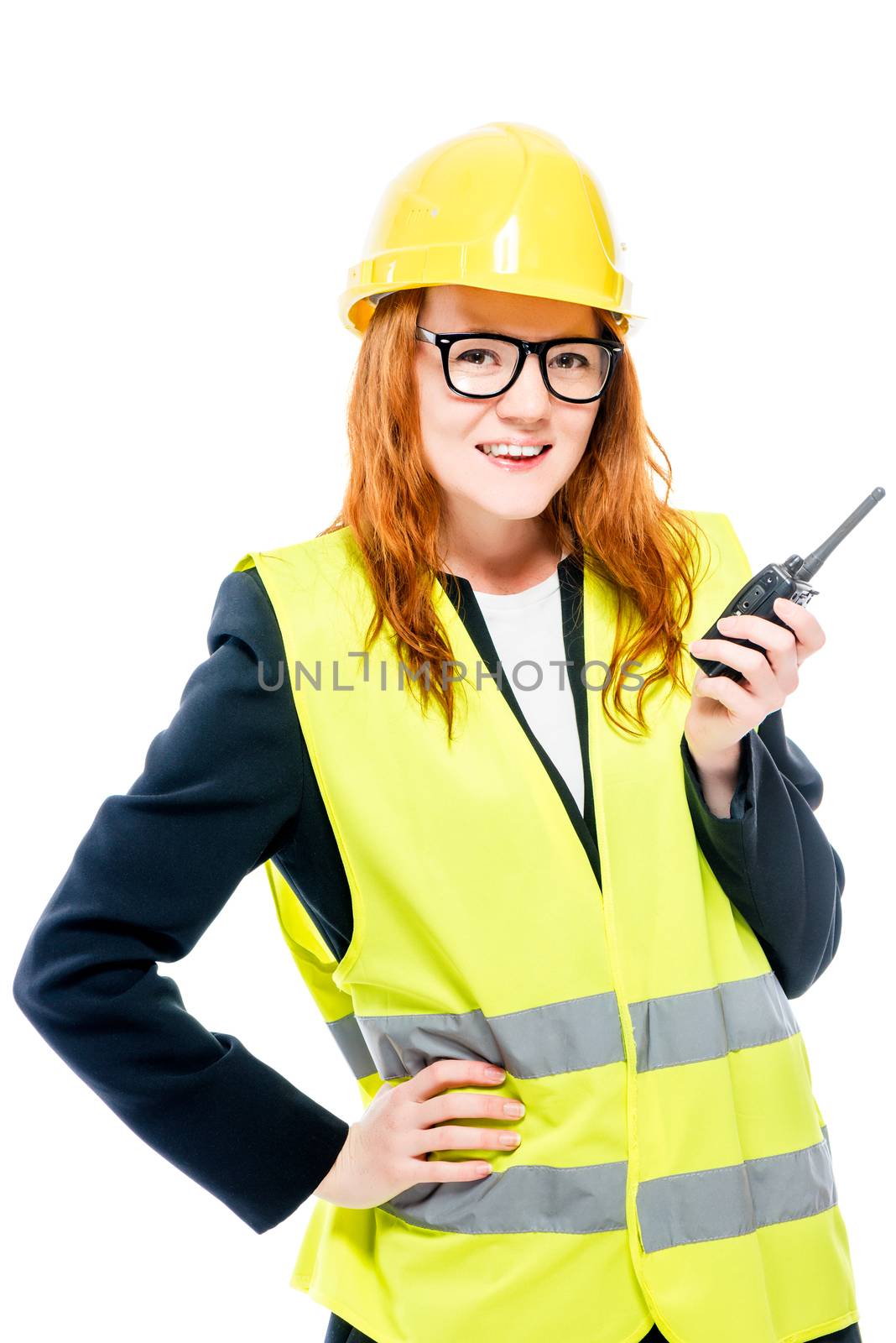 happy girl foreman with radio walker in hand posing on white background