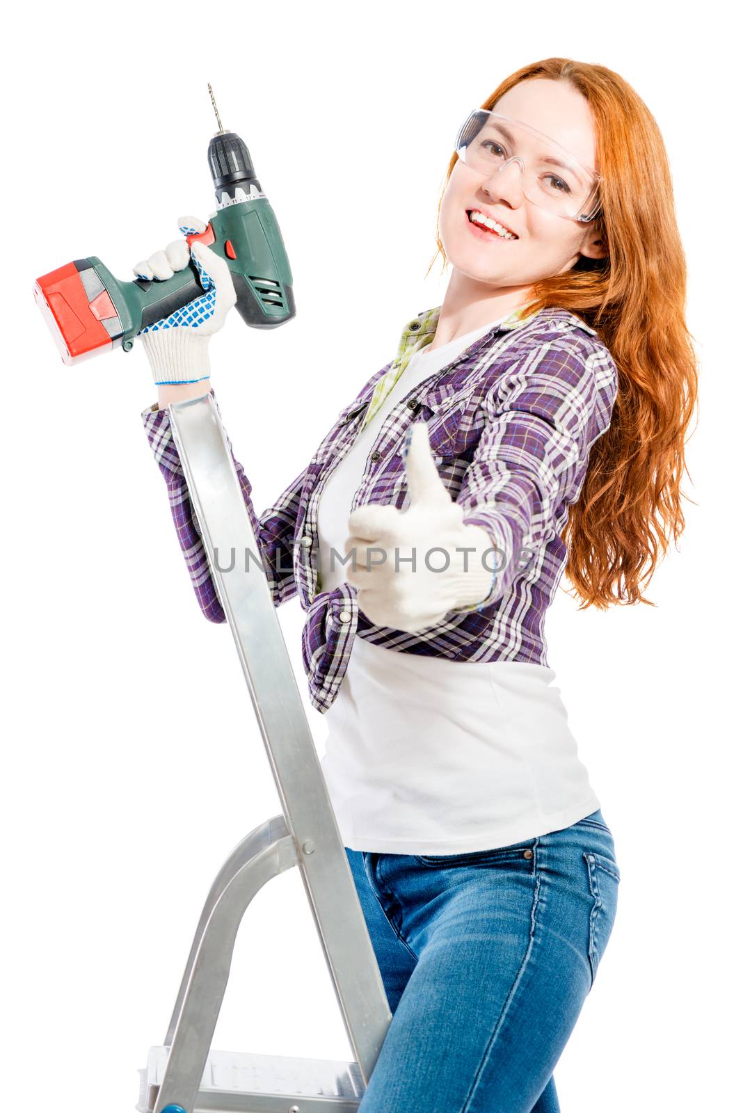 happy young woman with a tool on a white background