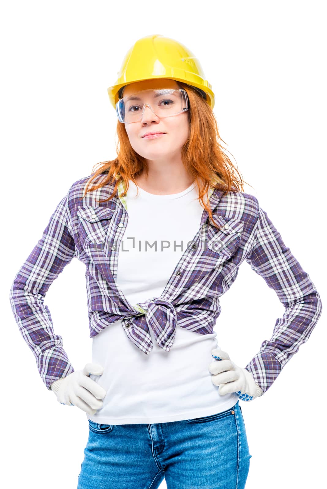 vertical portrait of a woman in a yellow hard hat and gloves on a white background