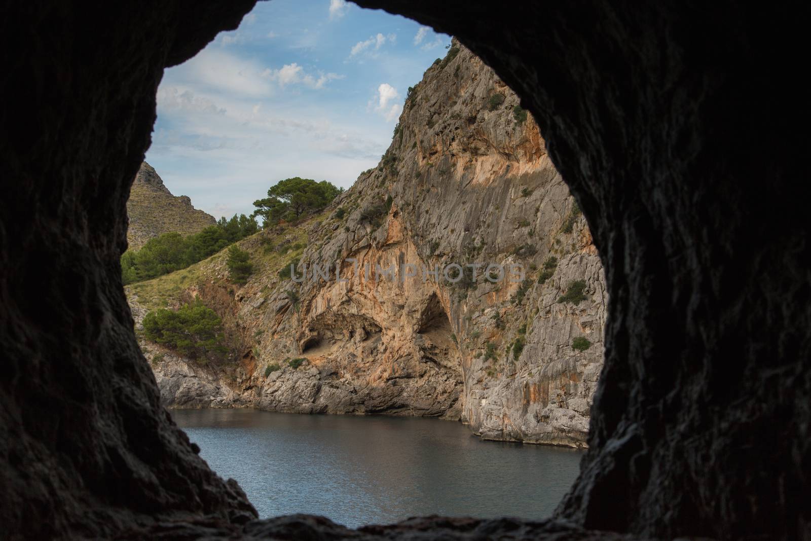 View of the bay through a hole in the cave