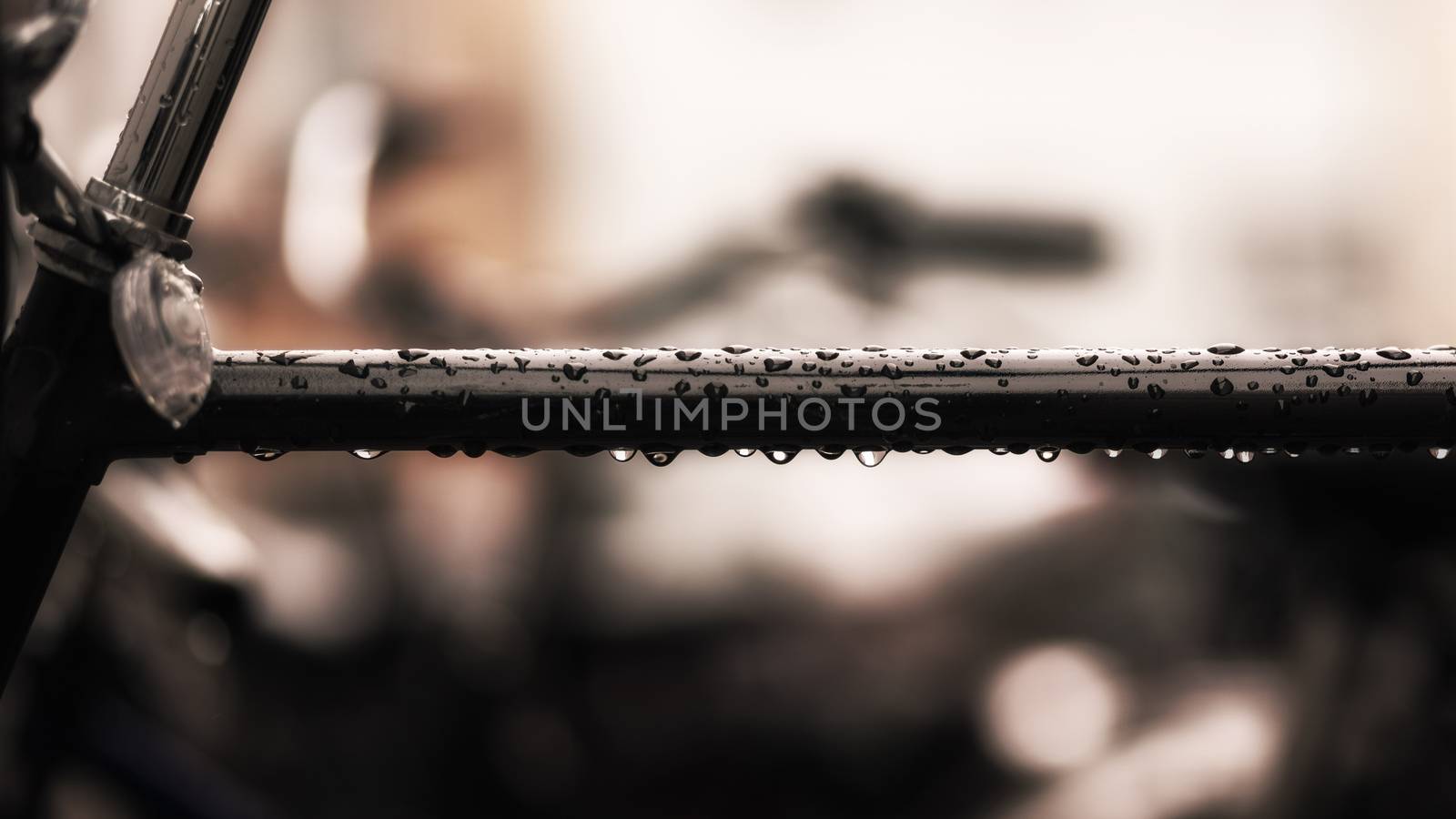 A bicycle rod with rain drops