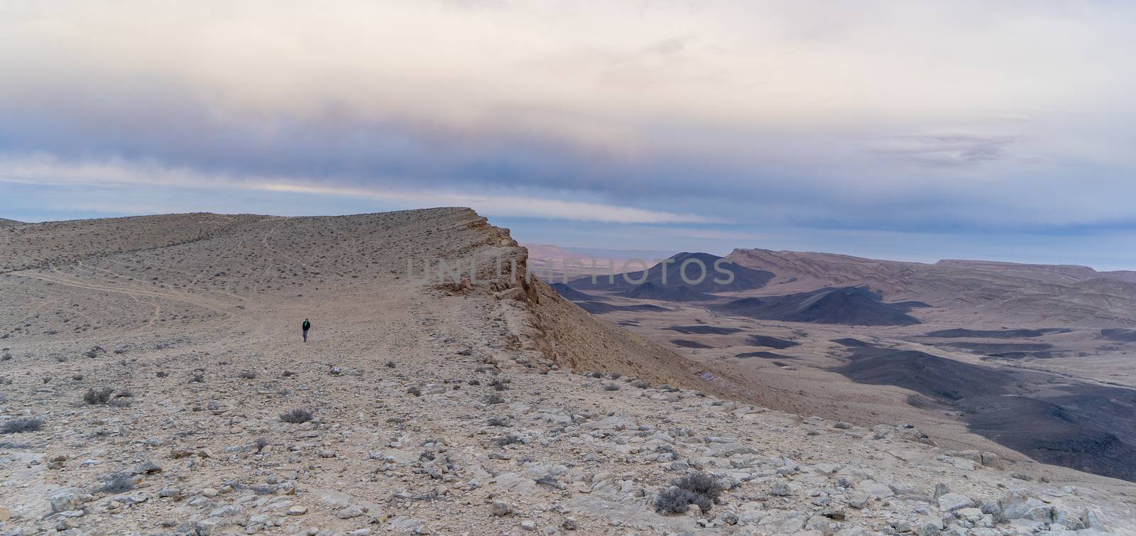 Travel and hiking in Israeli stone desert and crater