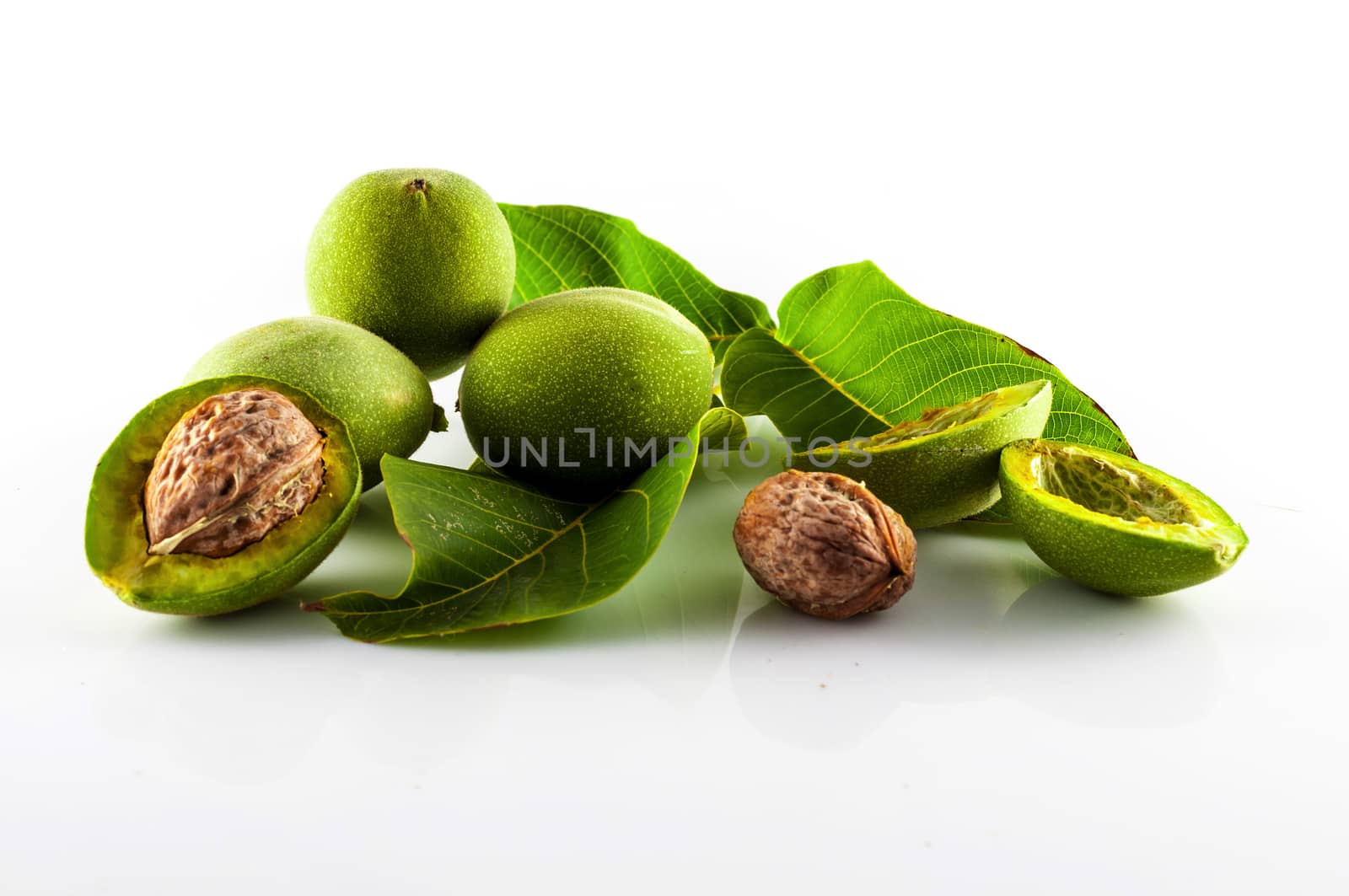 Isolated fresh walnuts on white background by replica