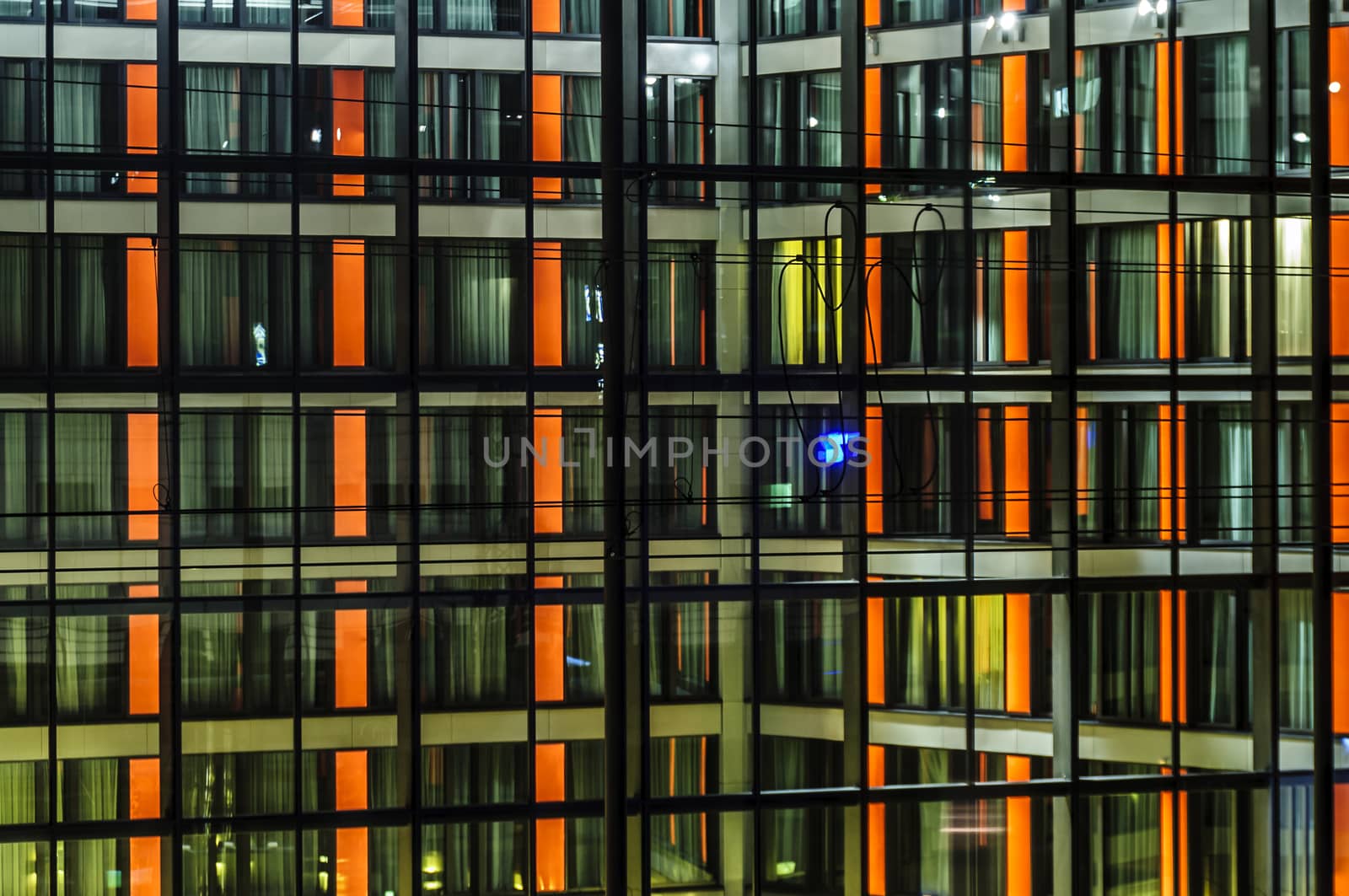Illuminated night front of modern building