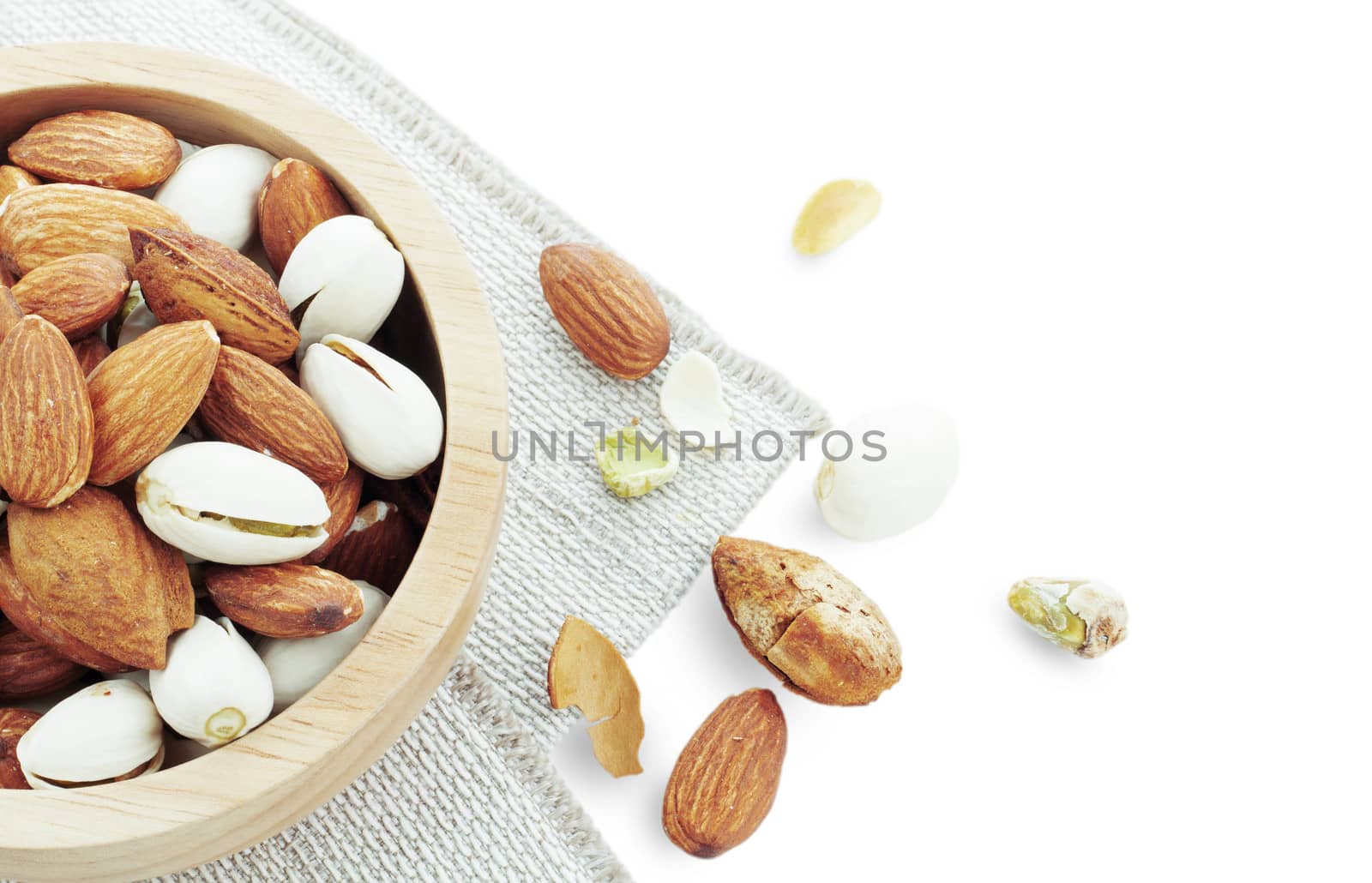 Assorted almonds in a bowl. by start08