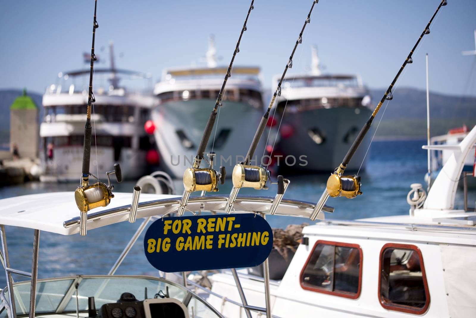 Big game fishing and equipment for rental with sign and equipment displayed