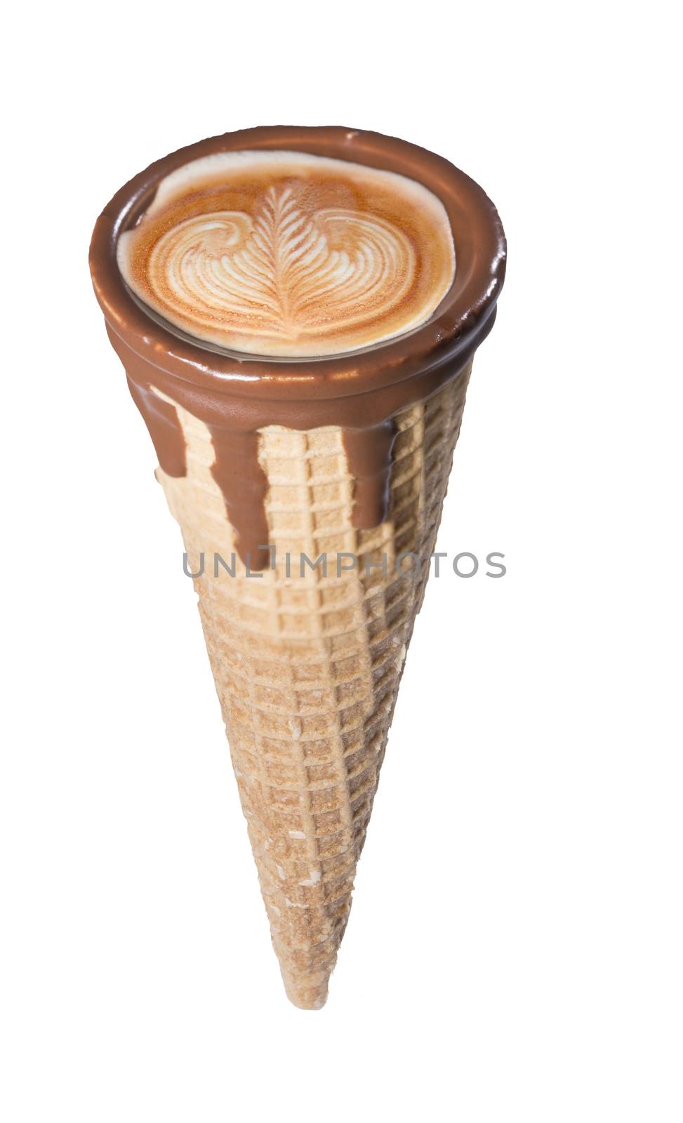 Coffee in waffle cone dipped in chocolate with drawings in capuccino / latte milk foam, latte art, isolated