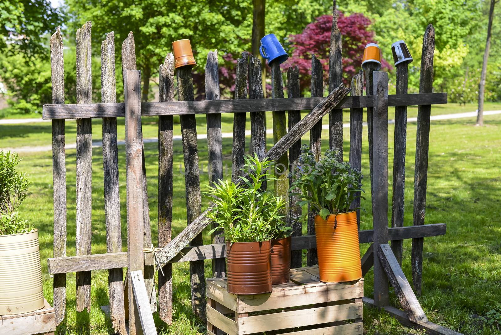 A rural wooden fence with colorful decoration