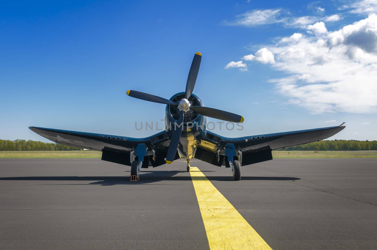 Chance Vought F4U Corsair on static display, front view from below. American WWII fighter plane, classic warbird, nickname whistling death