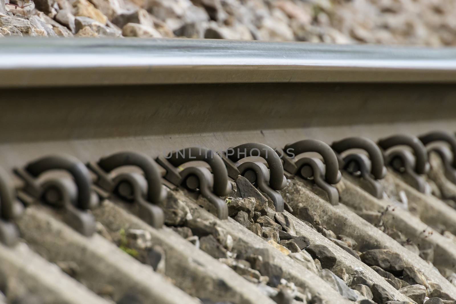 Detailed close up photo of a railroad track