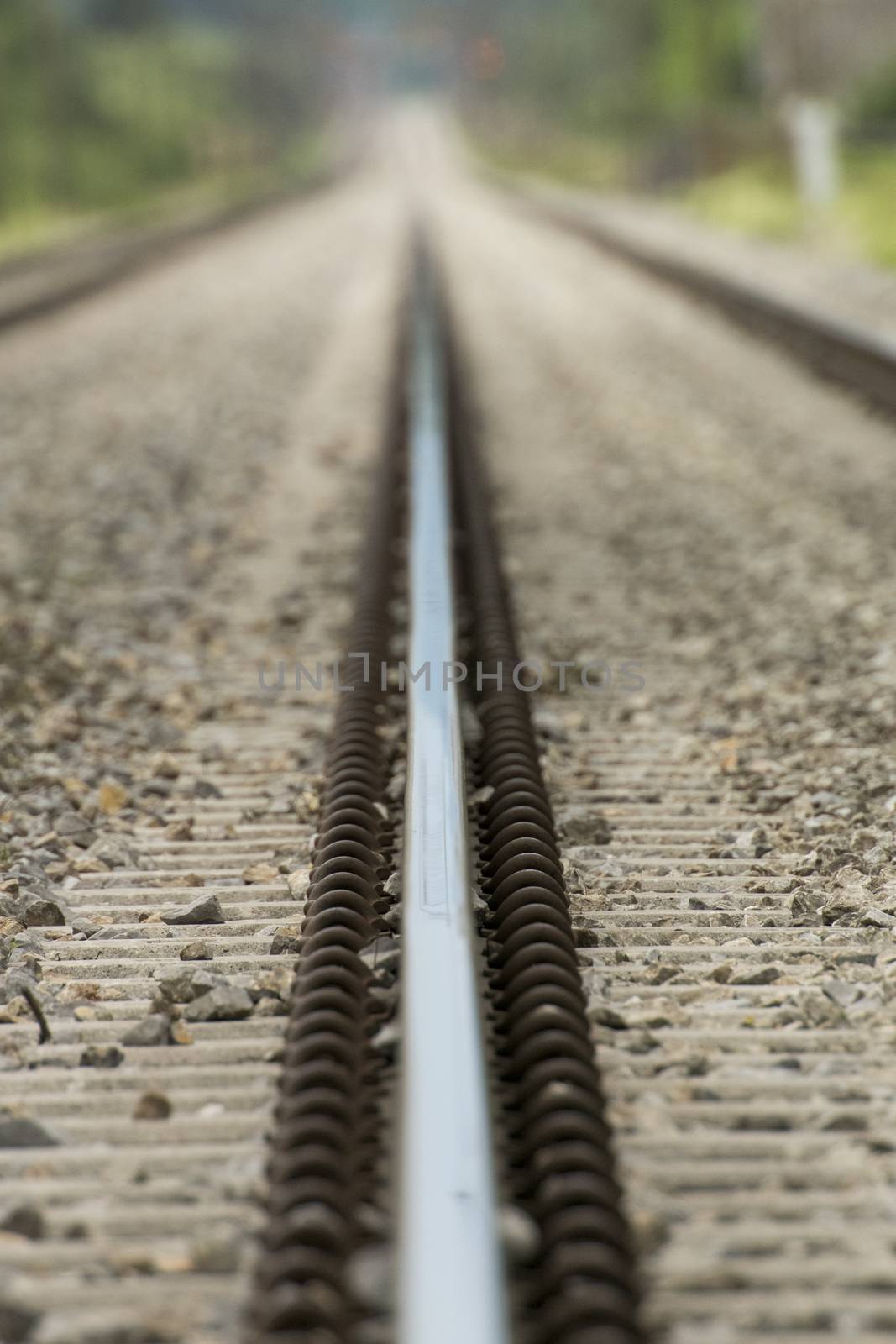 Detailed close up photo of a railroad track