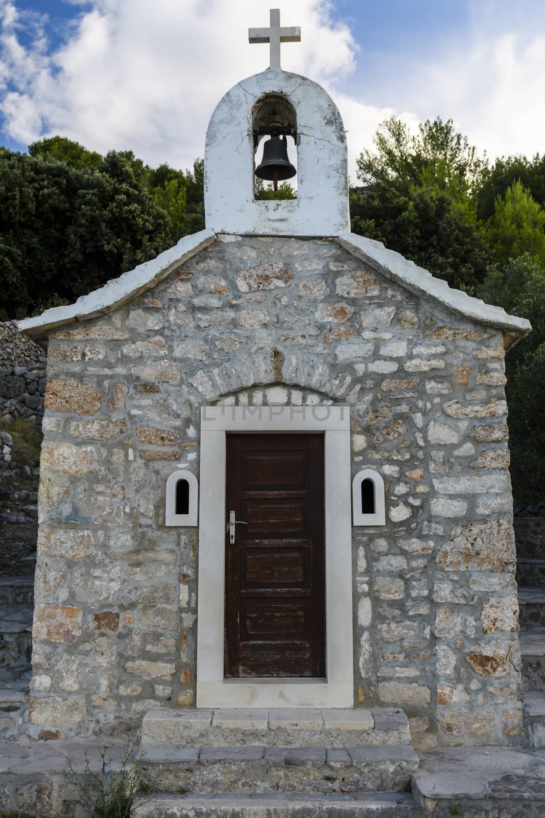Small stone chappel in the Mediterranean, island of Brac, Croati by asafaric