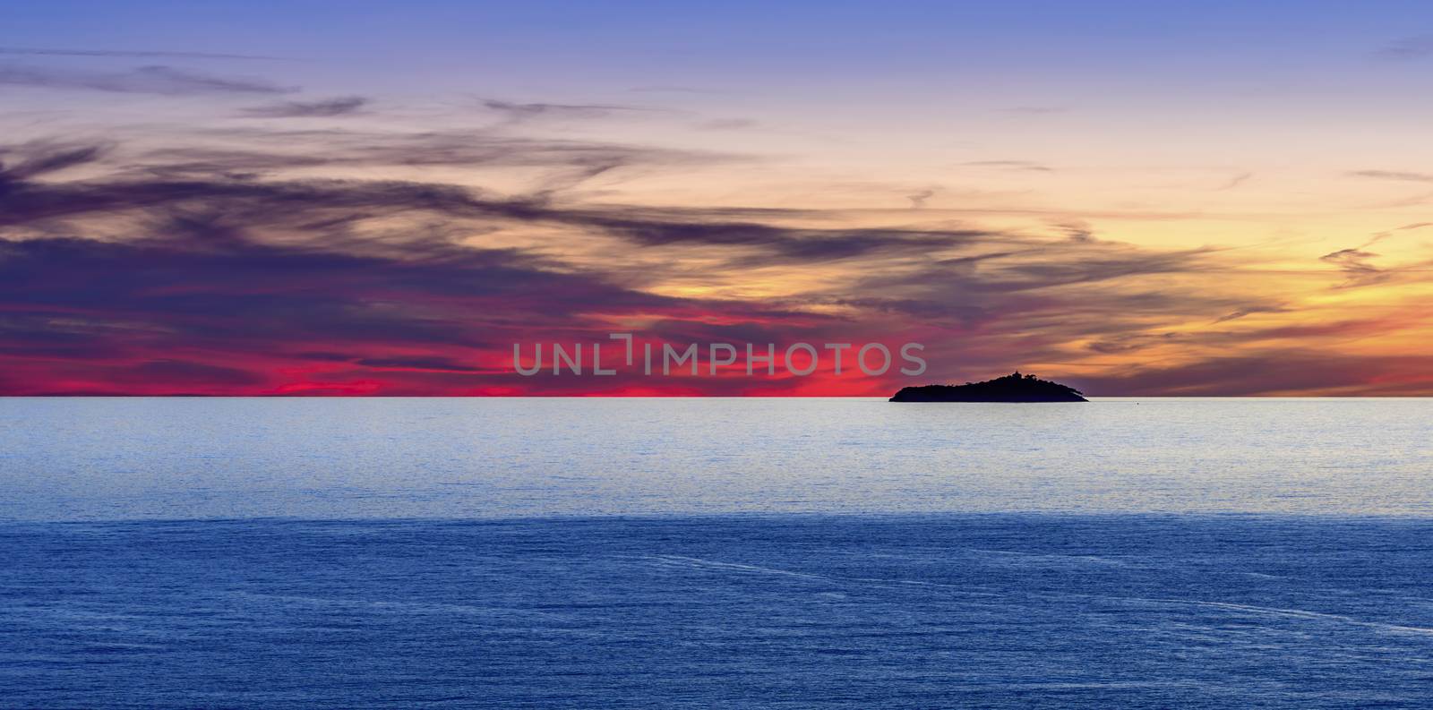 Sunset over Sveti Andrija island near Dubrovnik, Croatia by asafaric