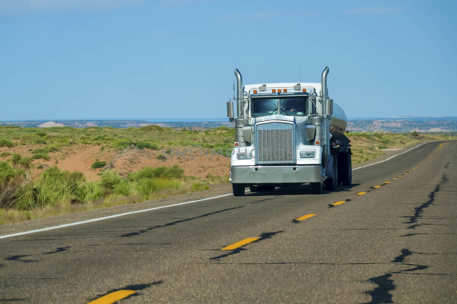 American Semitrailer Truck on Highway in the South West