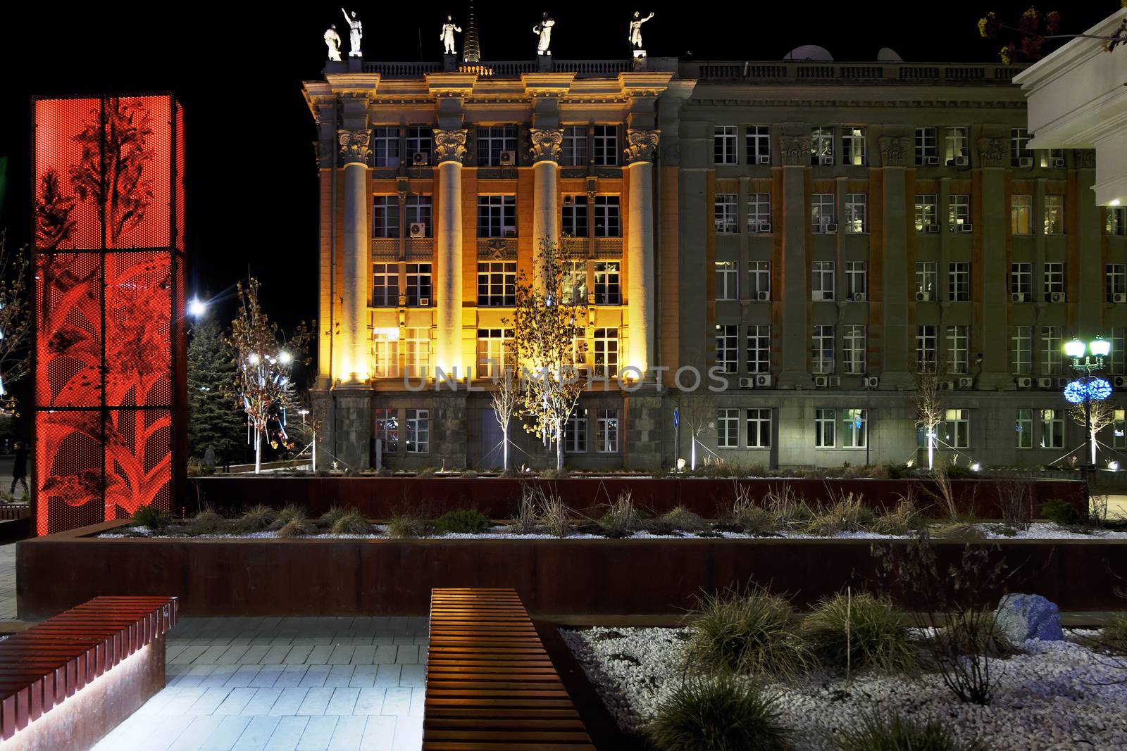 RUSSIA, EKATERINBURG — MAY 14, 2017 : The building of the City Hall in the central square of Yekaterinburg at night with illumination. Ekaterinburg is one of the largest cities in Russia, it will host the World Cup in 2018