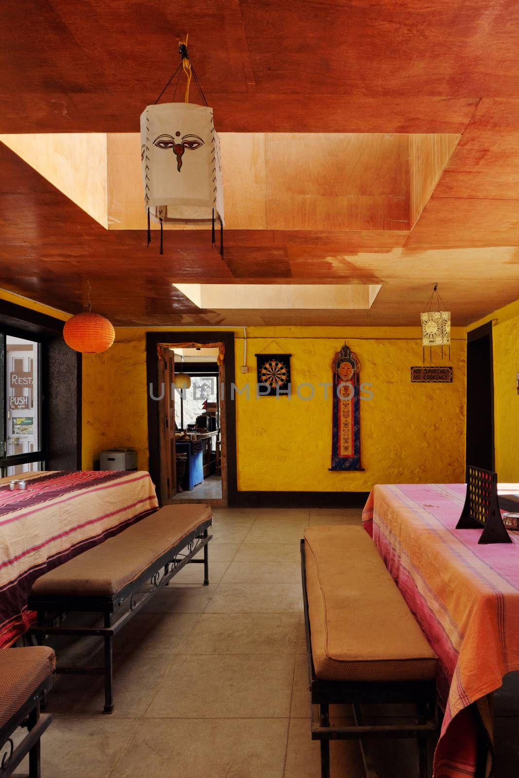 NEPAL. MANANG - NOVEMBER 16, 2016 : Interior dining room in the lodge base camp on the track around Annapurna, next to the Throng La Pass.  Manang largest alpine tourist town on the Annapurna Circuit.
