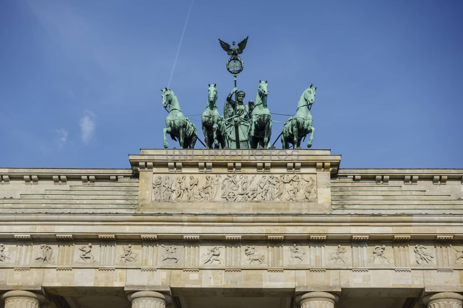 Brandenburg Gate - Brandenburger Tor in Berlin, Germany is one of the most known sites in Berlin and popular tourist attraction