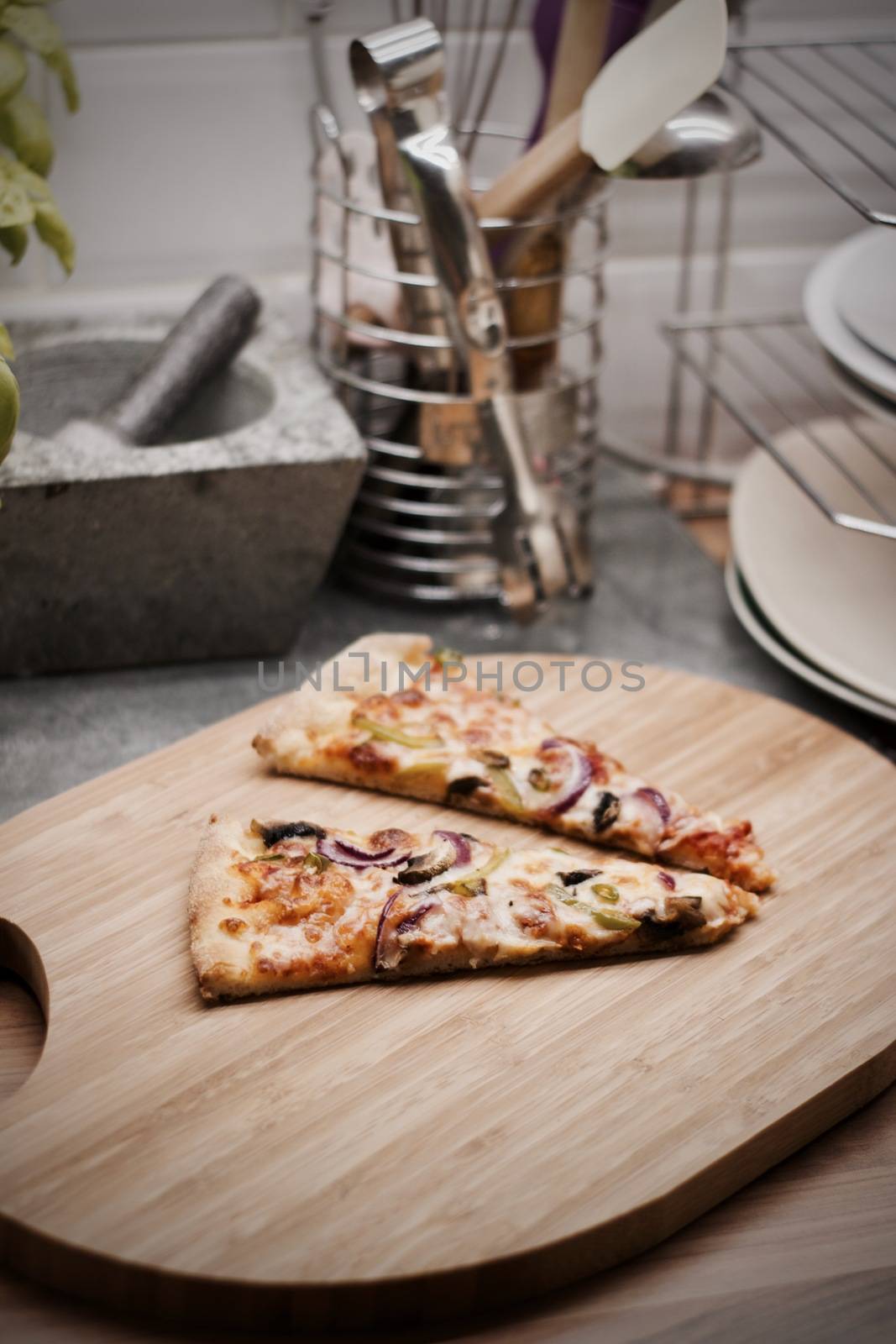 Fresh and tasty vegetarian spicy pizza in the kitchen. Fast food concept.