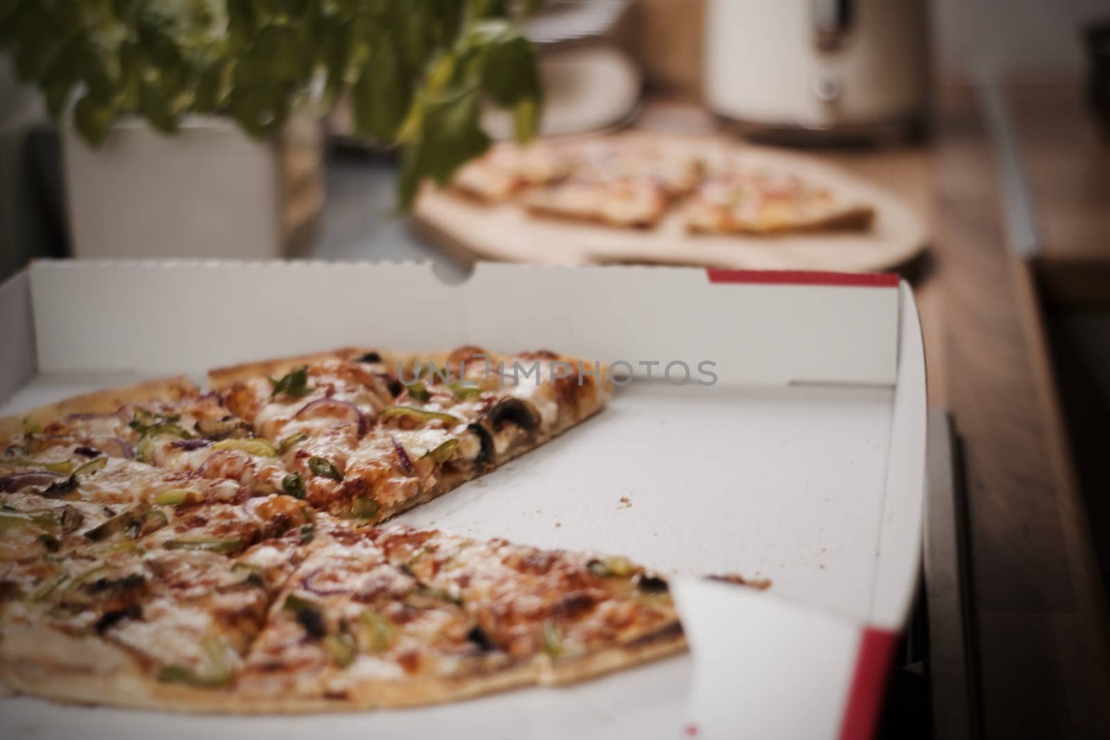 Fresh and tasty vegetarian spicy pizza in the kitchen. Fast food concept.