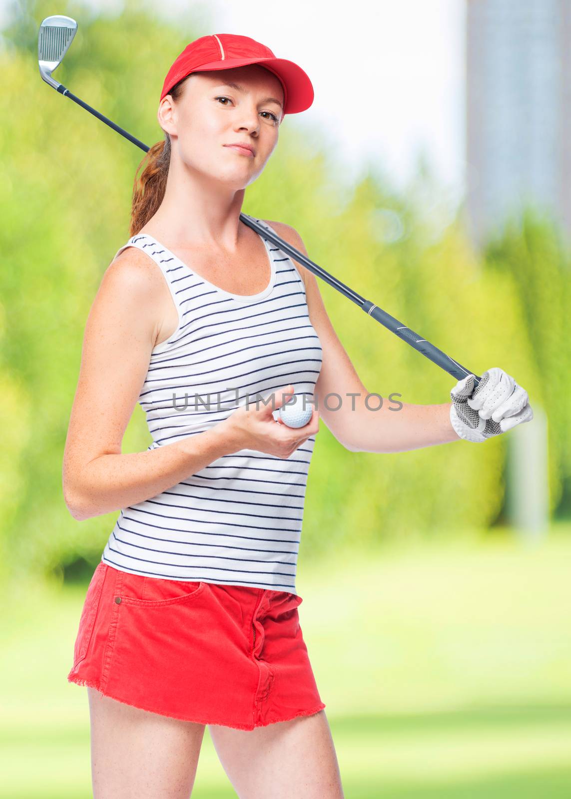 Slender sportswoman golfer with stick and ball on a background o by kosmsos111