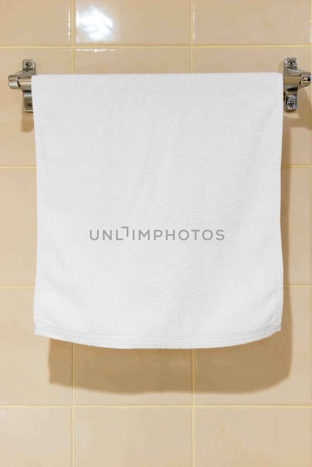 white terry towel hanging in the bathroom on the drier by kosmsos111