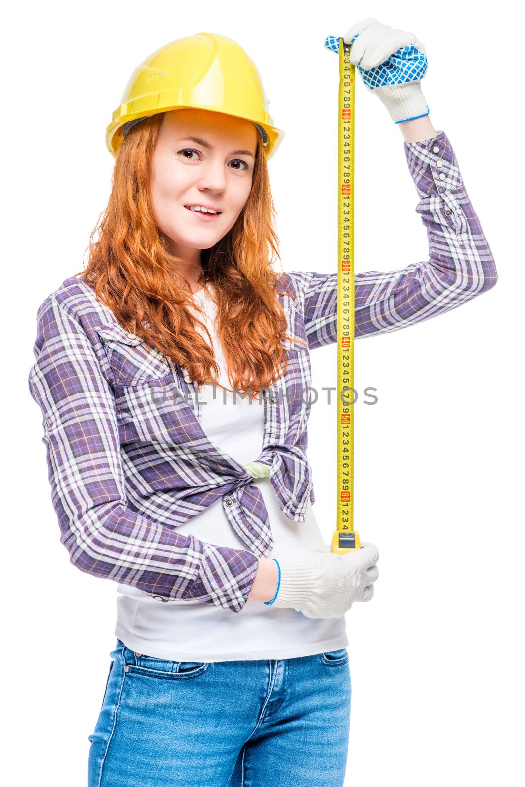 carpenter's male profession, woman with a tape measure on a white background