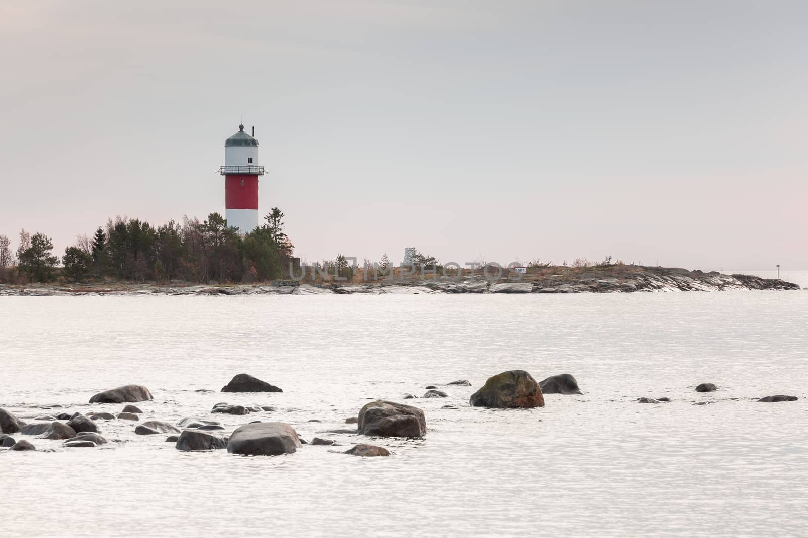 Light House in Holmsund, Sweden with a cloudy sky.