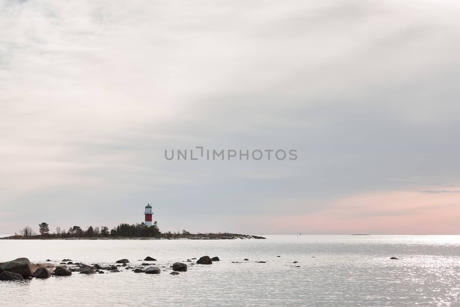 Light House in Holmsund, Sweden with a cloudy sky.