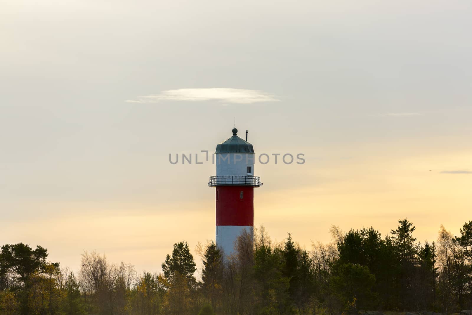 Light House in Holmsund, Sweden with a cloudy sky.