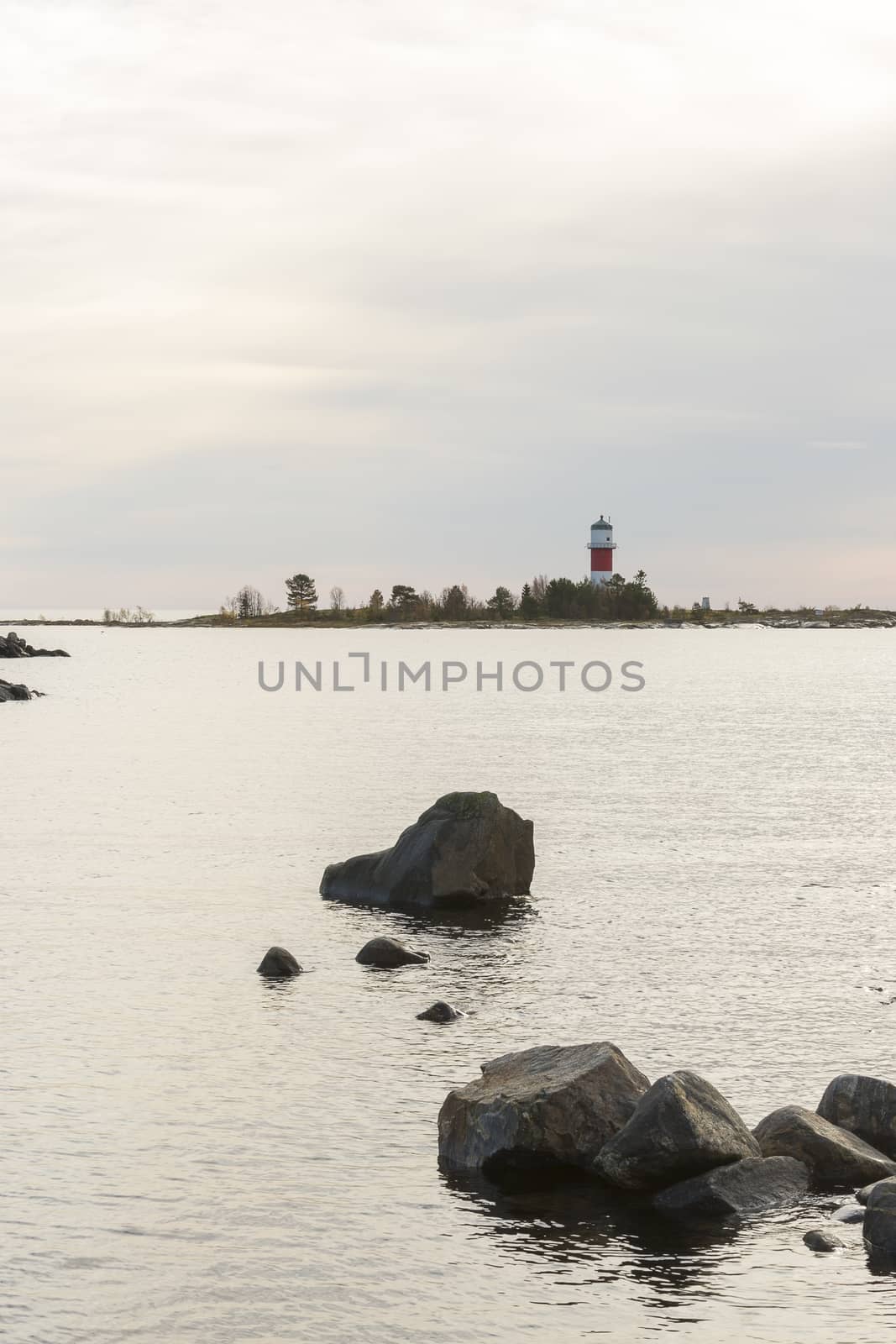 Light House in Holmsund, Sweden with a cloudy sky.