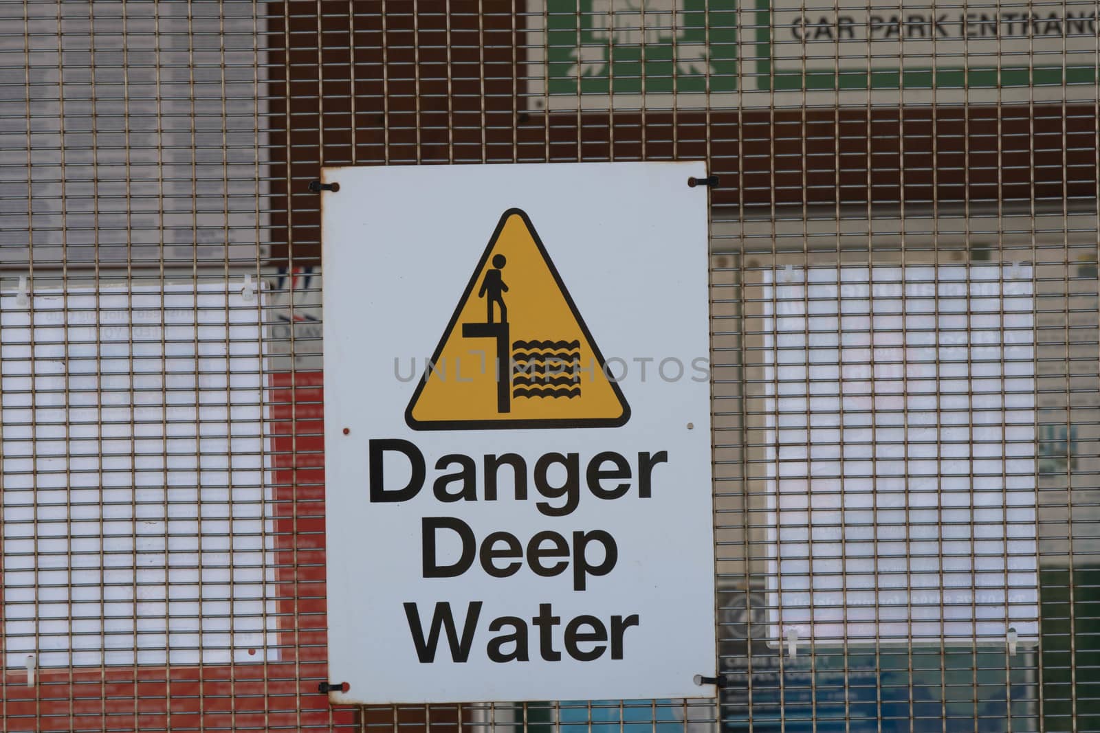 A sign warning of deep water