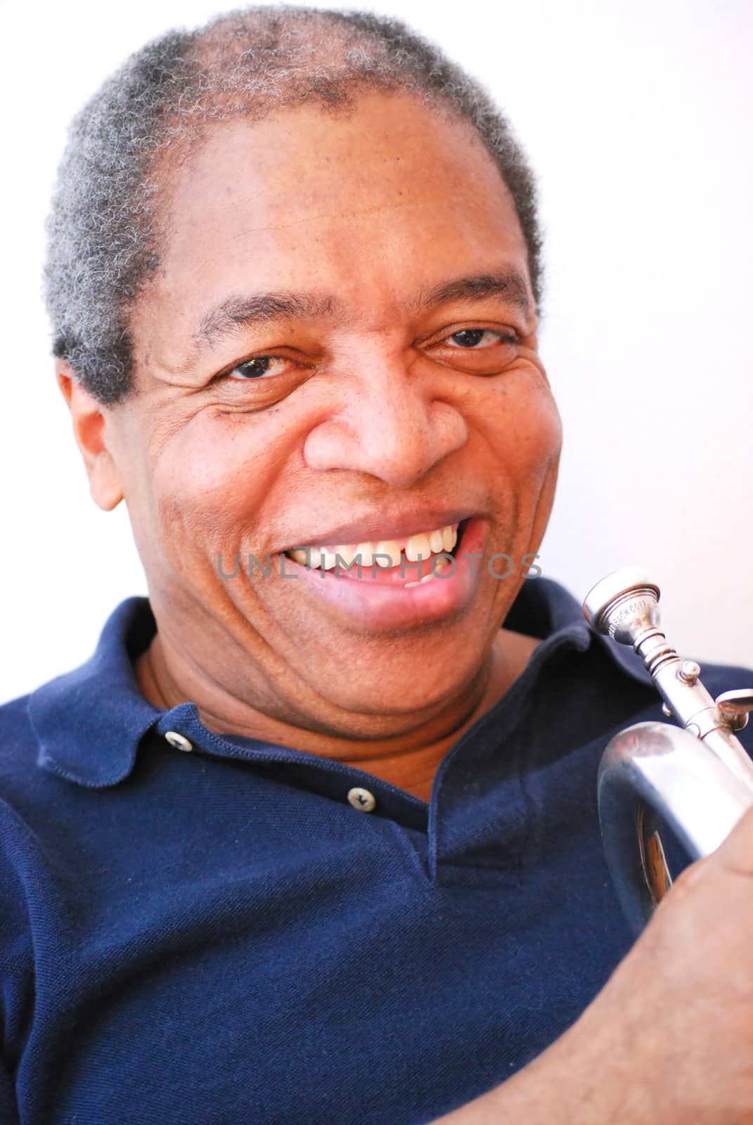 African american jazz musician with his flugelhorn.