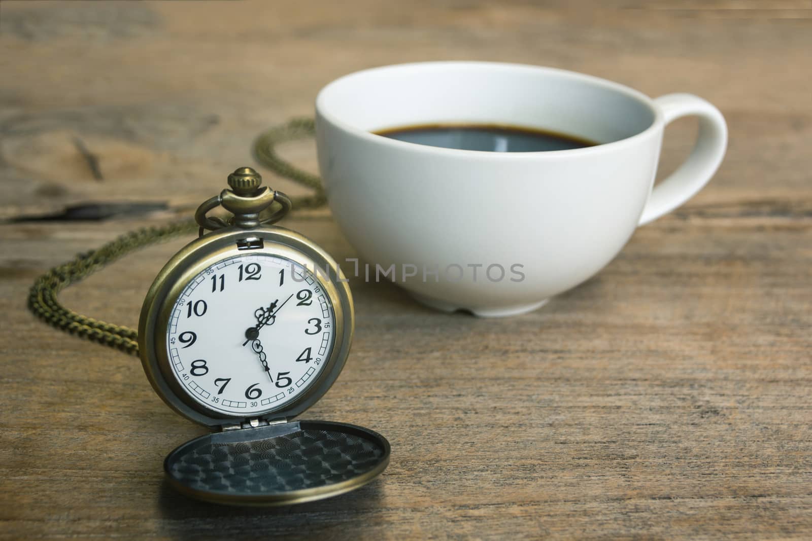 Pocket watch with coffee latte art, relax time 