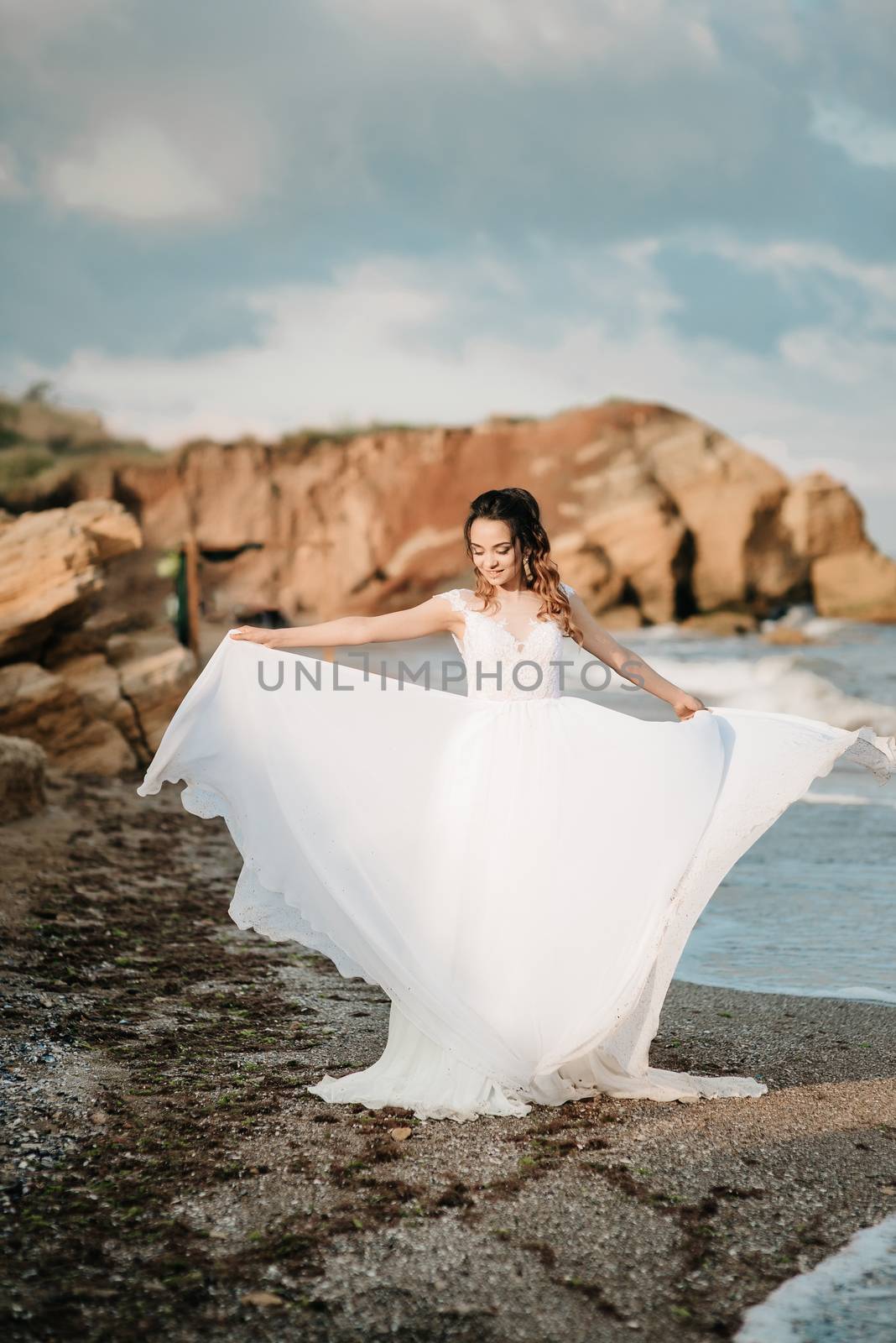bride on the shore of the black sea by Andreua